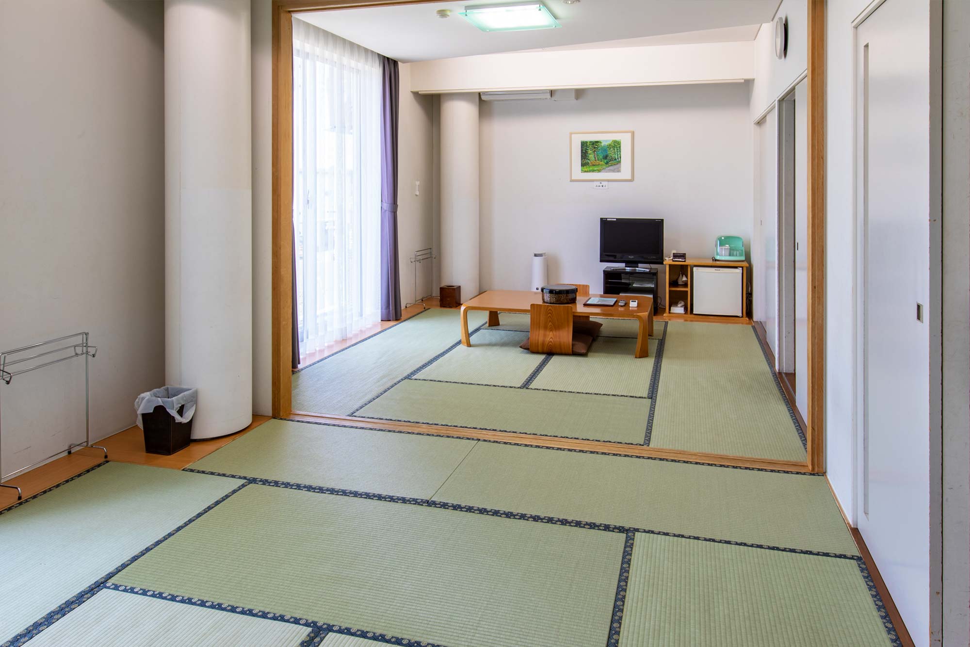 海道新十津川町サンヒルズサライ　客室　和室2つ分の広さの大部屋の写真2